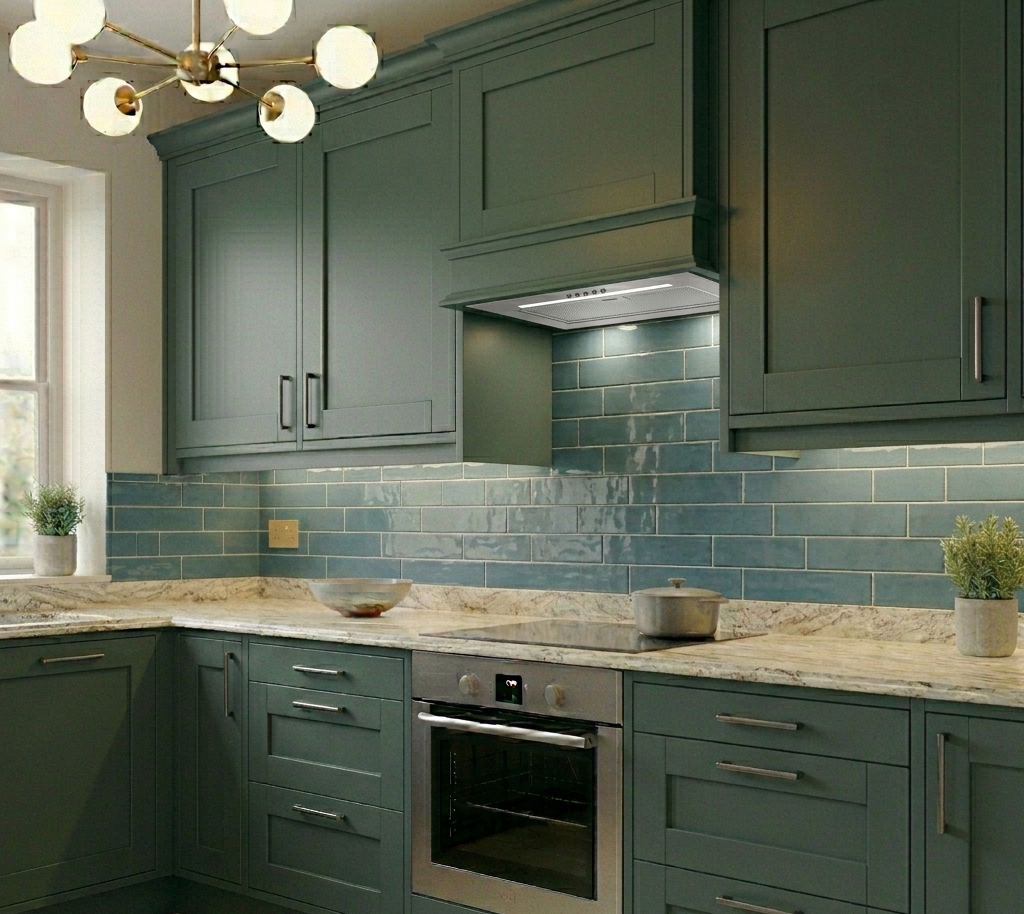 Stainless steel 55cm canopy cooker hood integrated into green shaker kitchen cabinets with teal subway tiles and LED under-cabinet lighting.