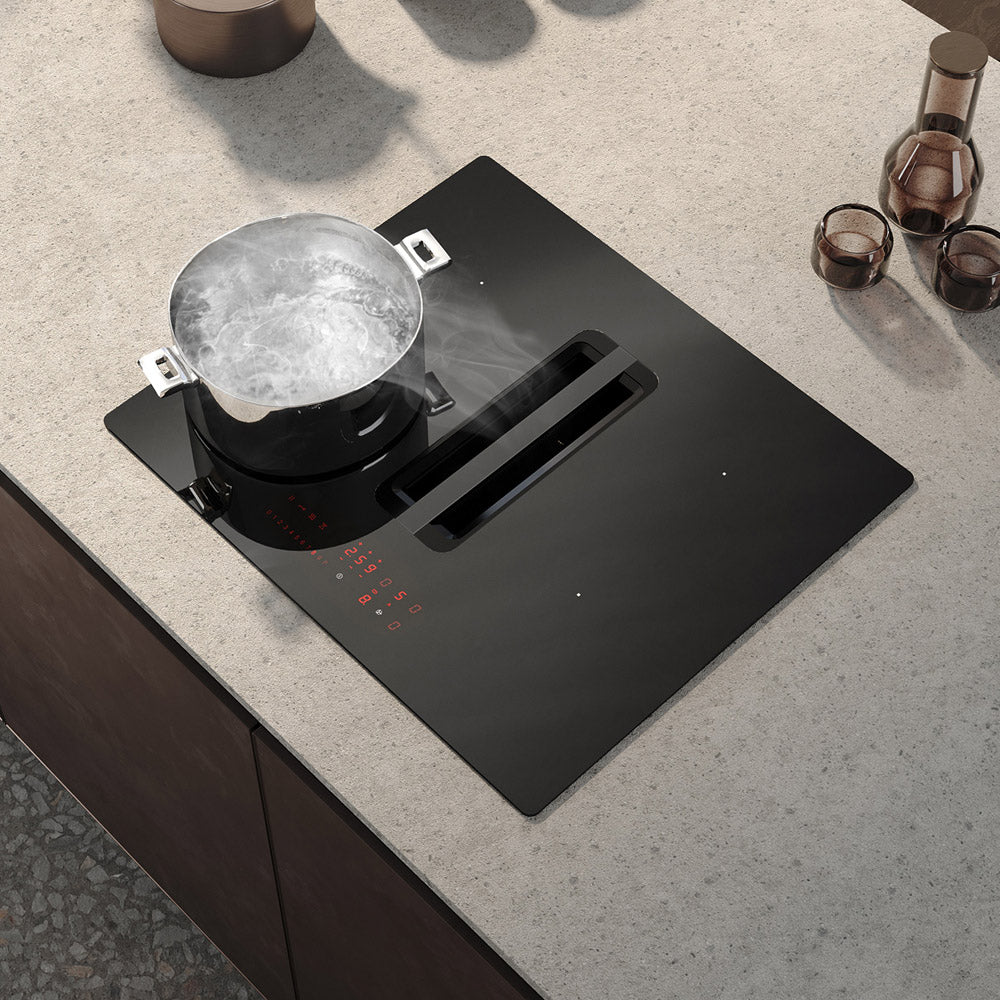Arcus 60cm vented induction downdraft extractor installed in a grey marble countertop 