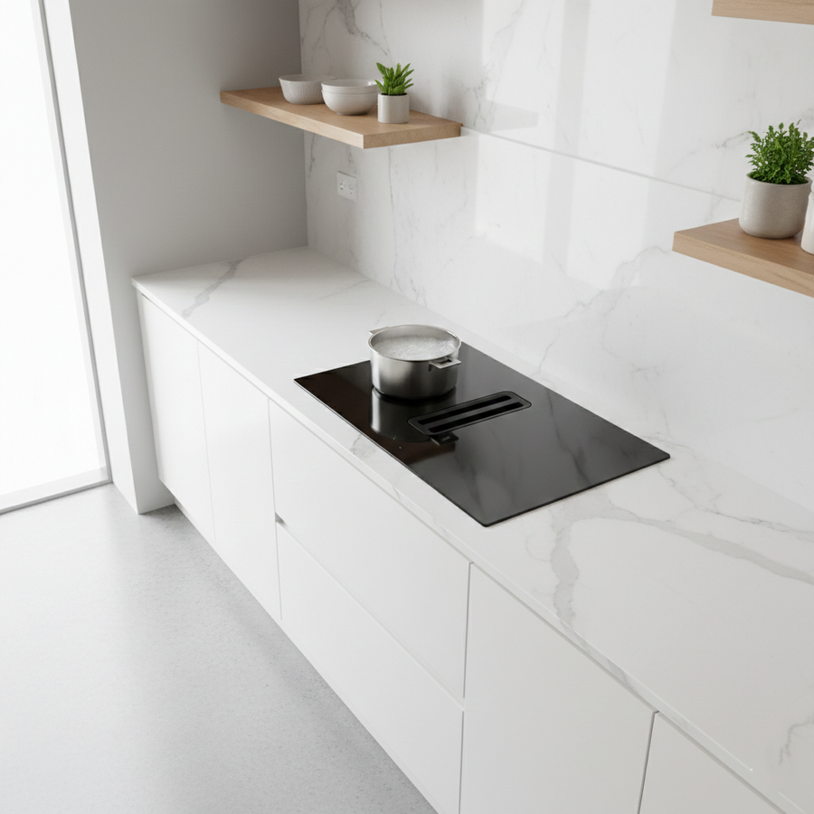75cm Arcus downdraft extractor induction hob installed within a white kitchen featuring marble countertop and backsplash 