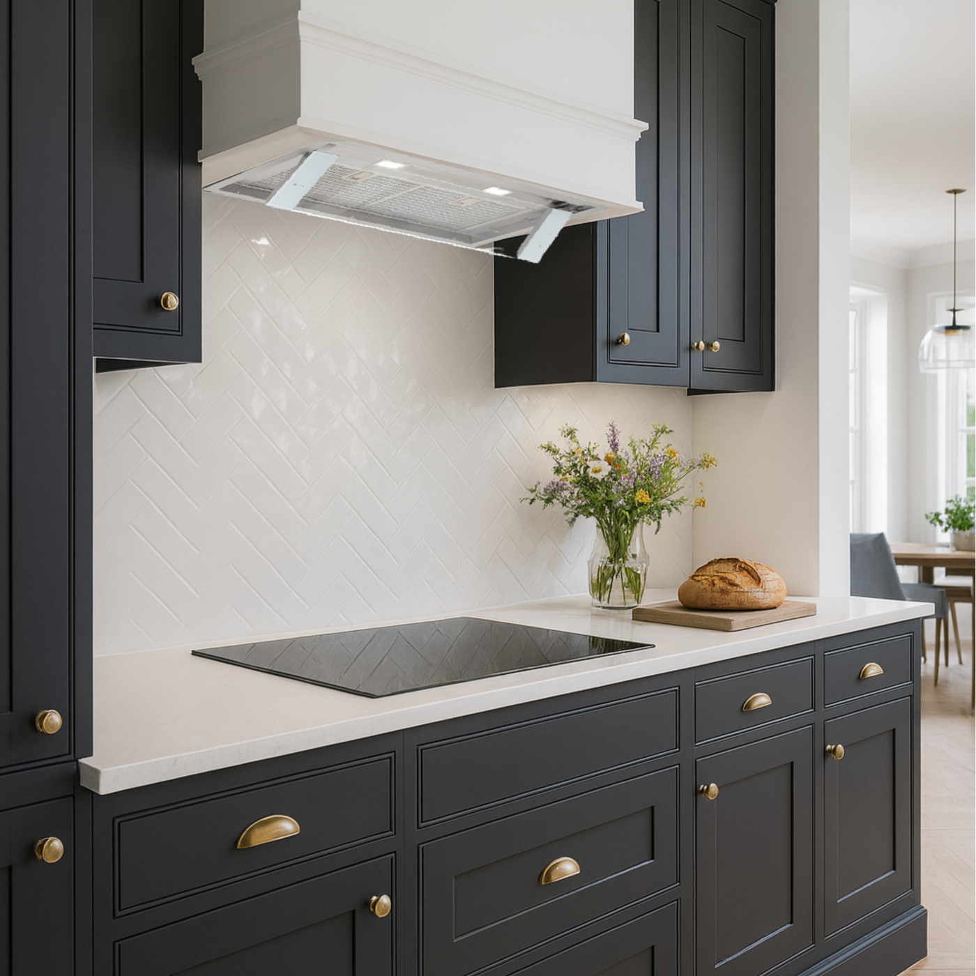 Luxair 86cm Tornia canopy cooker hood integrated into a white mantel surround in a dark charcoal shaker kitchen