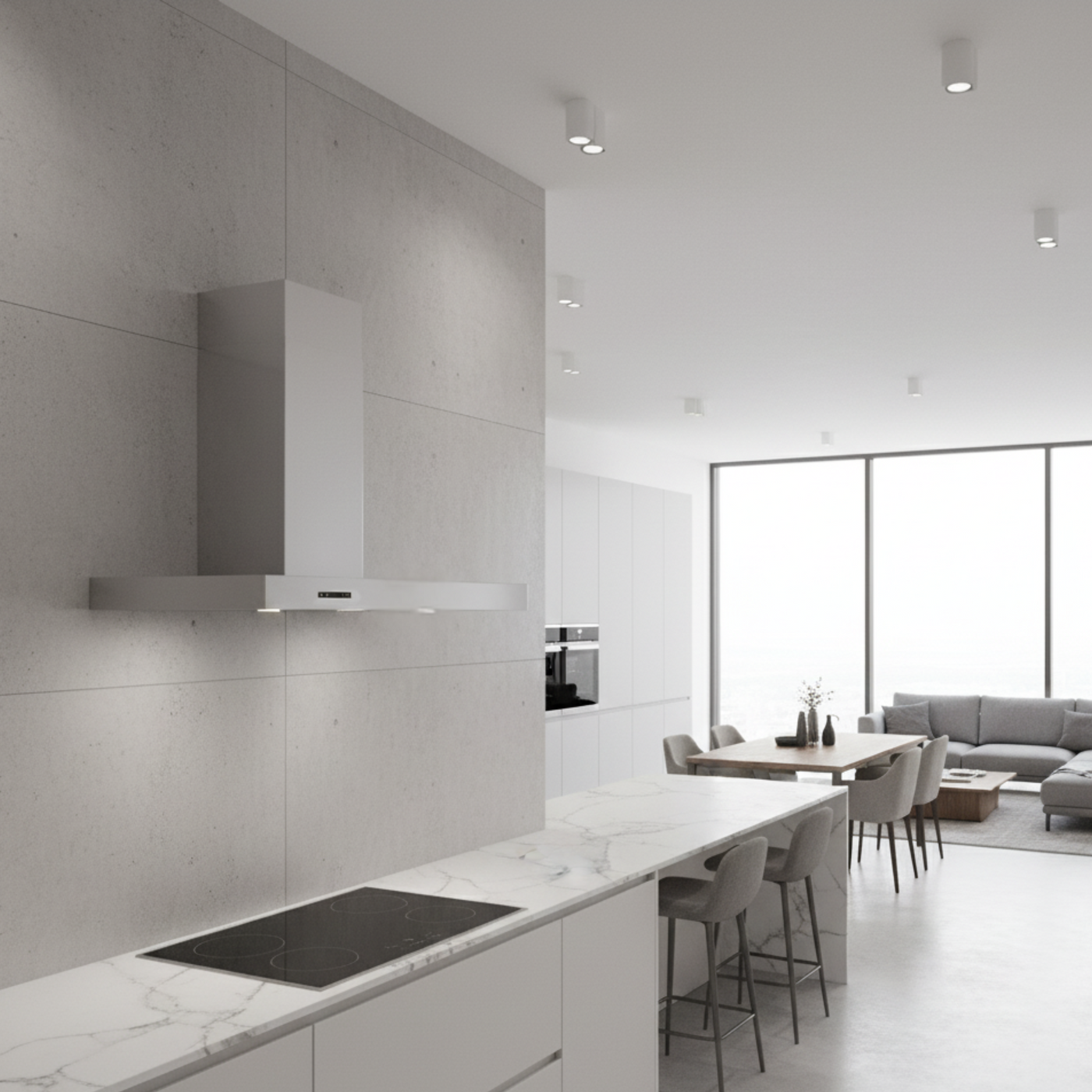 Left Hand chimney Arezzo cooker hood in stainless steel situated within a large open plan kitchen featuring marble worktops.