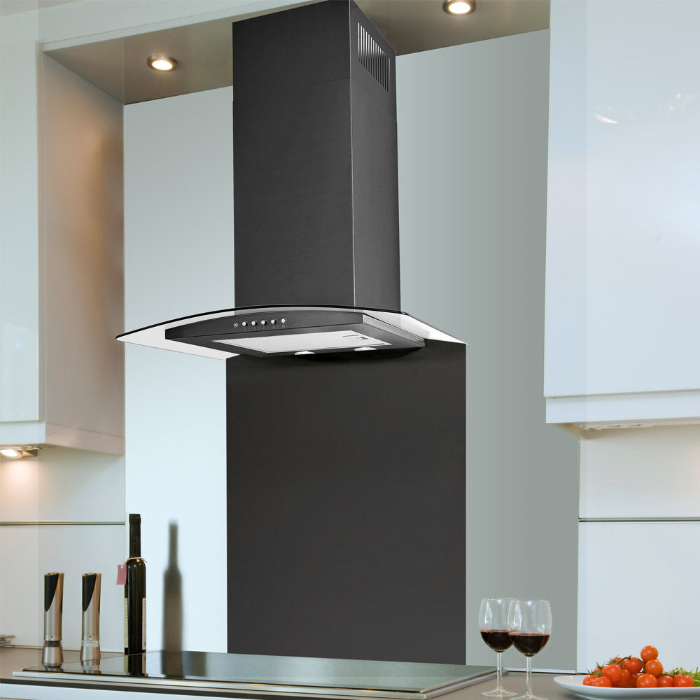 Black Artis curved cooker hood installed within a white kitchen with spotlights and black backsplash