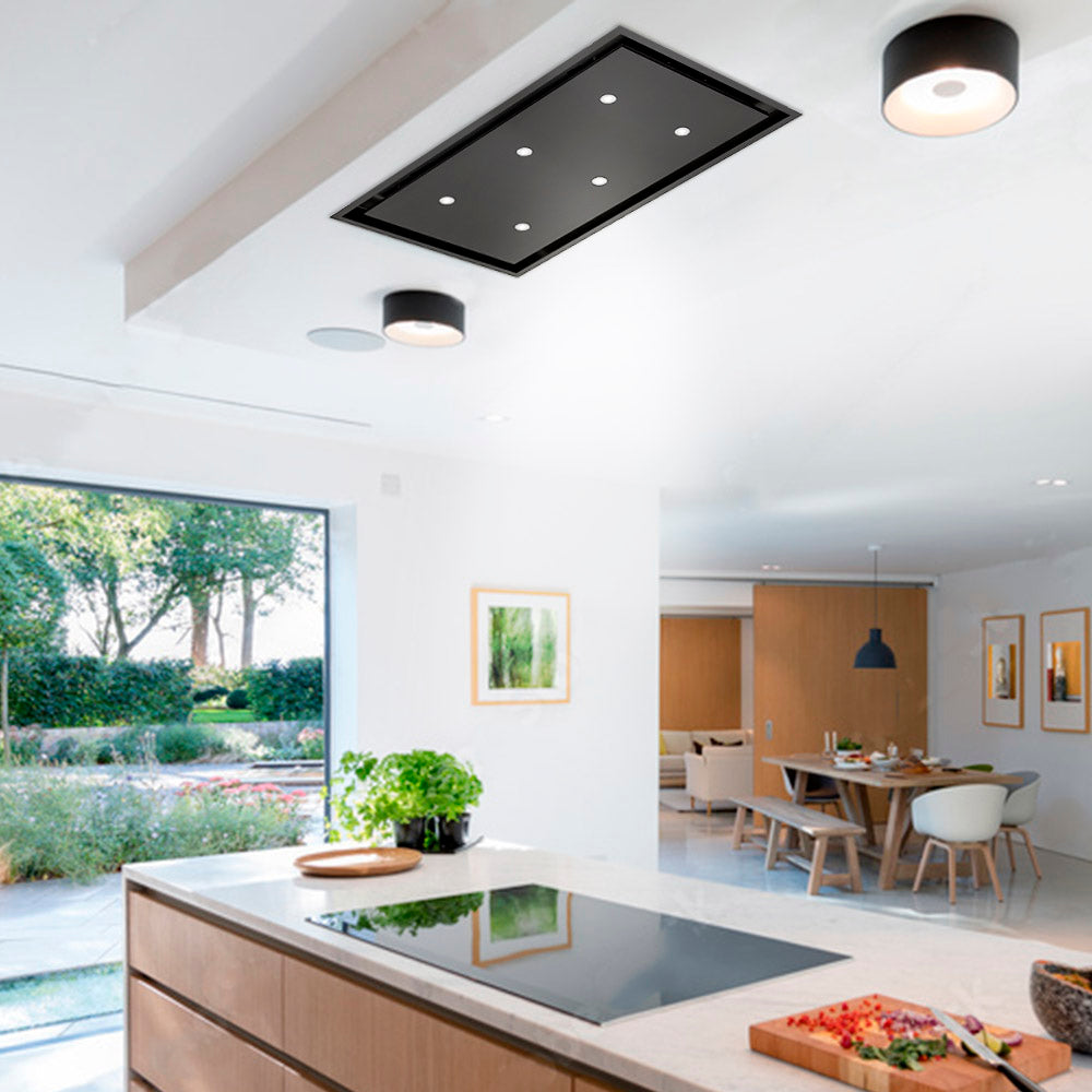 90cm Black Anzi External Motor Ceiling Cooker Hood Installed Within a Modern White and Wood Kitchen.