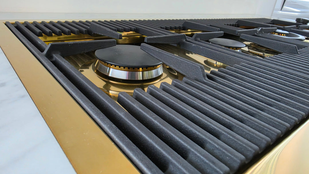 Milanello gas hob in gold with cat iron pan 