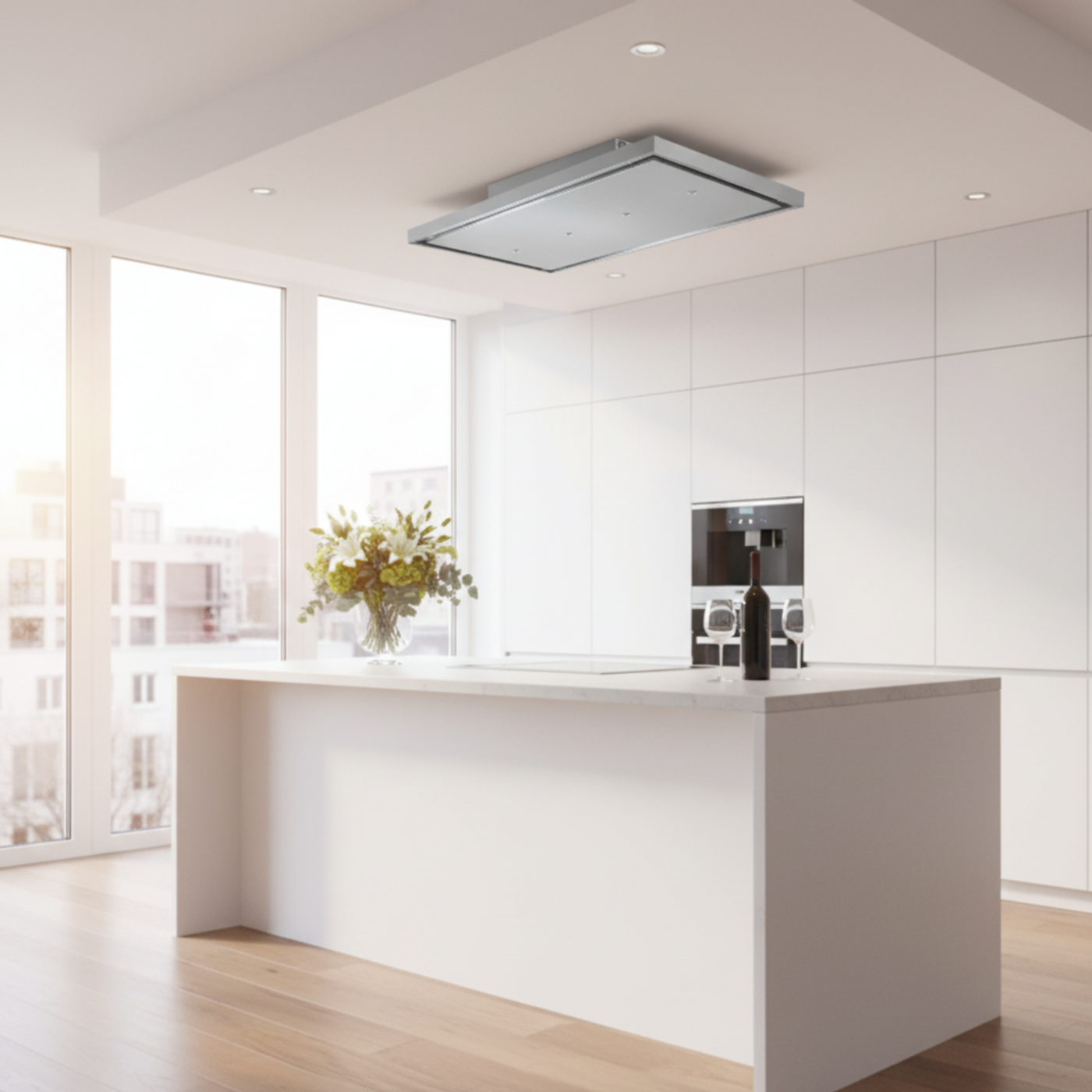 Stainless Steel Nuvola Recirculating Cooker Hood Installed In a Sleek and Minimalistic Kitchen.