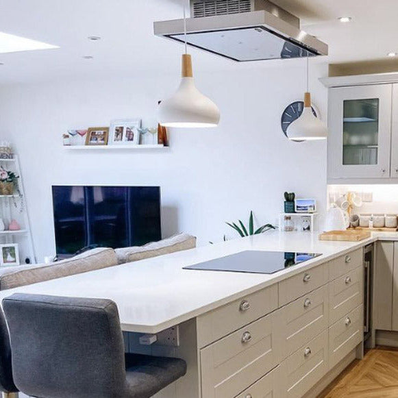 90cm Nuvola Recirculating Ceiling Cooker Hood Installed Within a Traditional Kitchen Featuring Pendant Lighting. 
