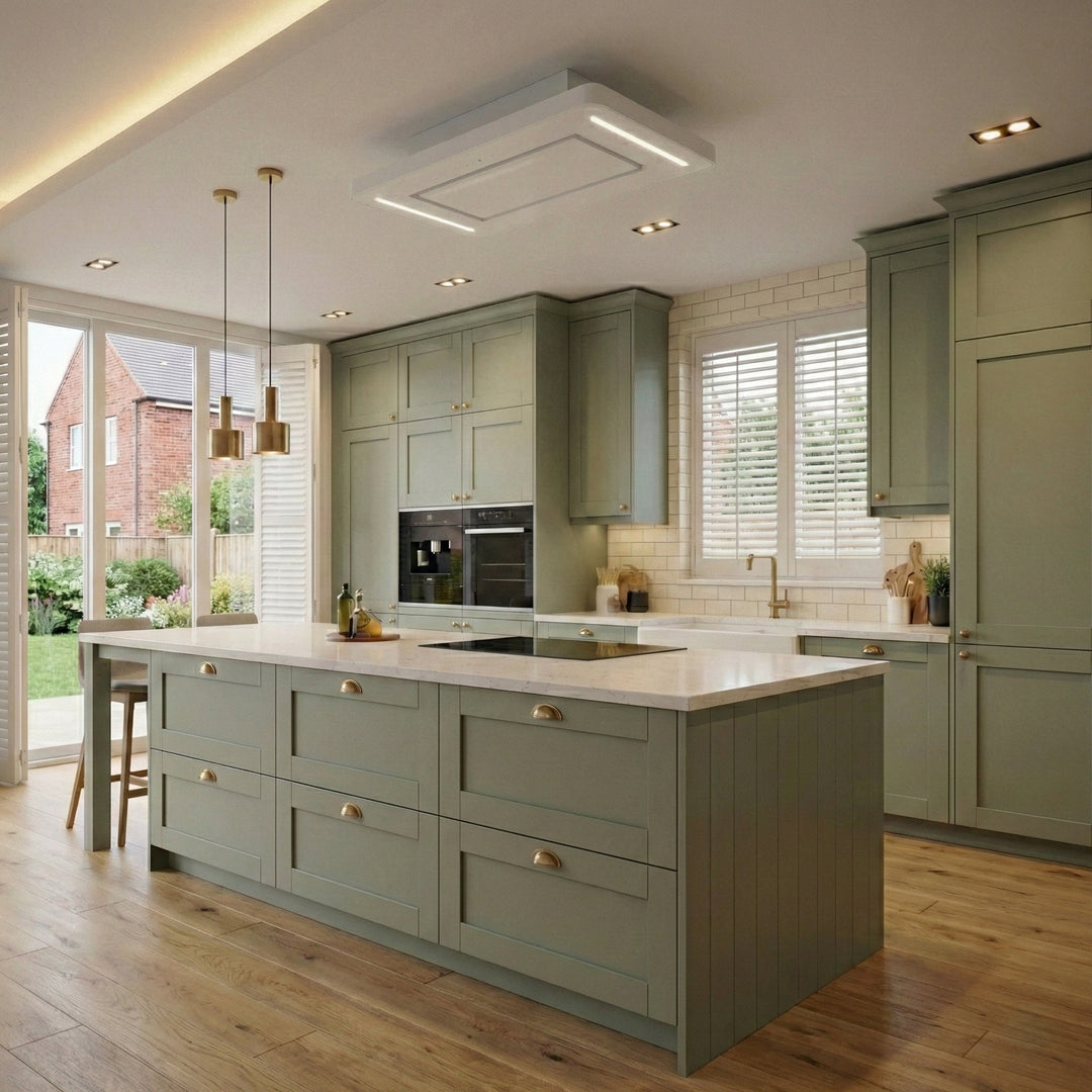 90cm Orion Recirculating Ceiling Cooker Hood Within a Modern Kitchen With Green Cabinets, White Countertops, and Wooden Flooring.