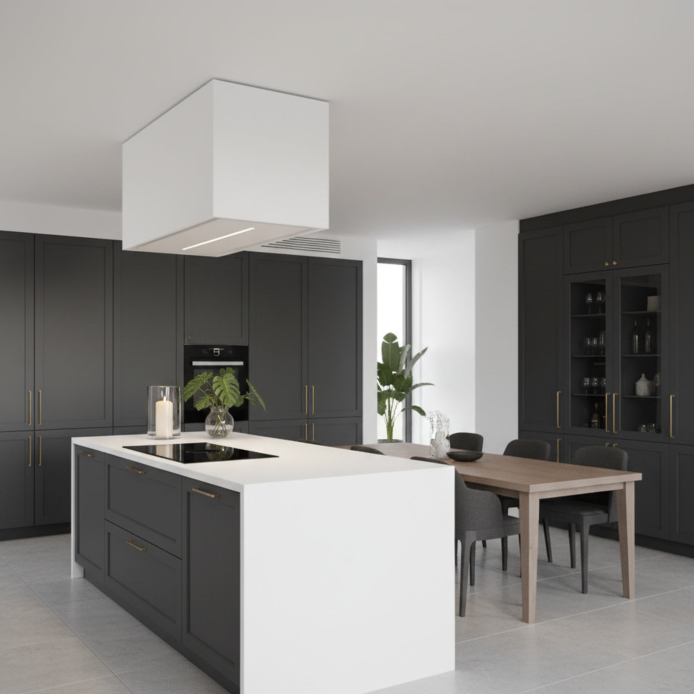 White Synergy Cooker Hood Installed In a Dropped Box Within a Modern Dark Grey Kitchen With White Countertops.