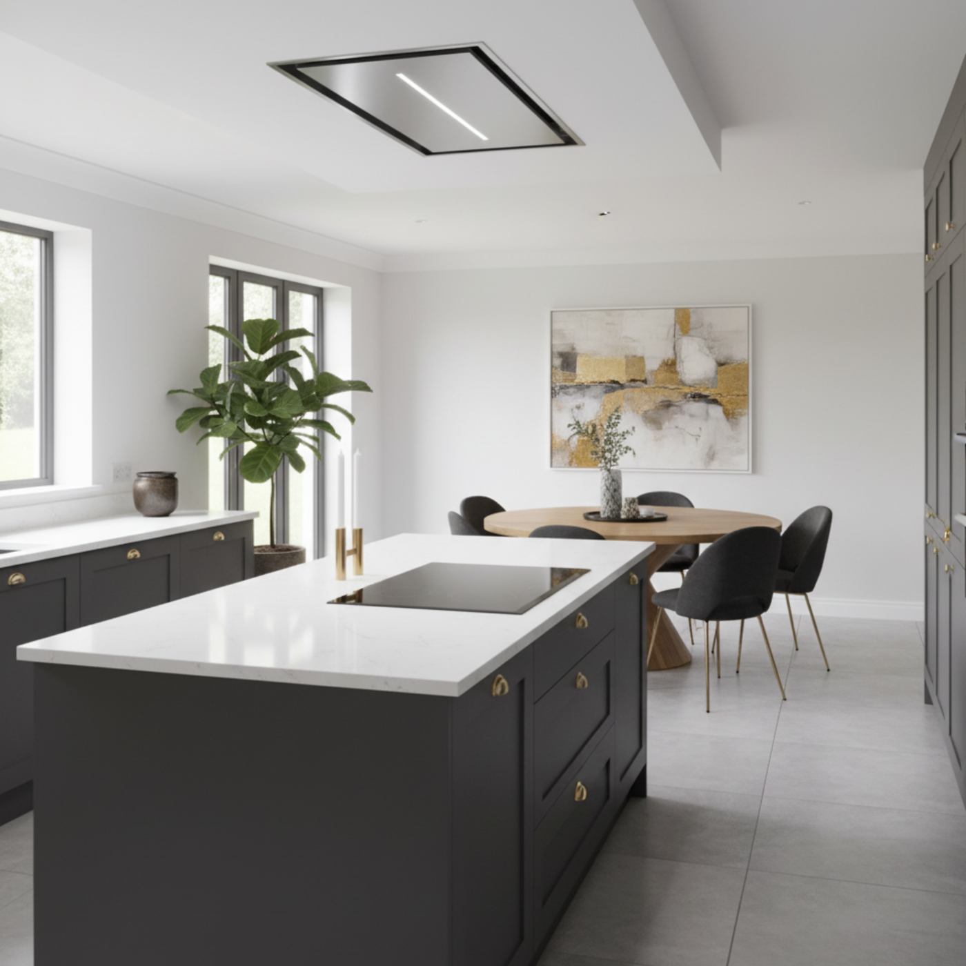 Synergy Ceiling Mounted Cooker Hood In Modern Kitchen With a Central Dark Grey Island, Chairs, And a Dining Area.