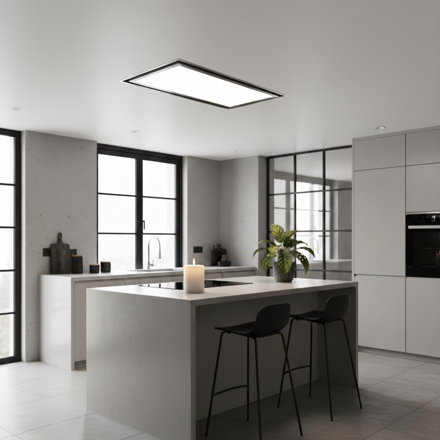 Tolvi Ceiling Cooker Hood Installed In Modern kitchen with a white island, black bar stools, and large windows.