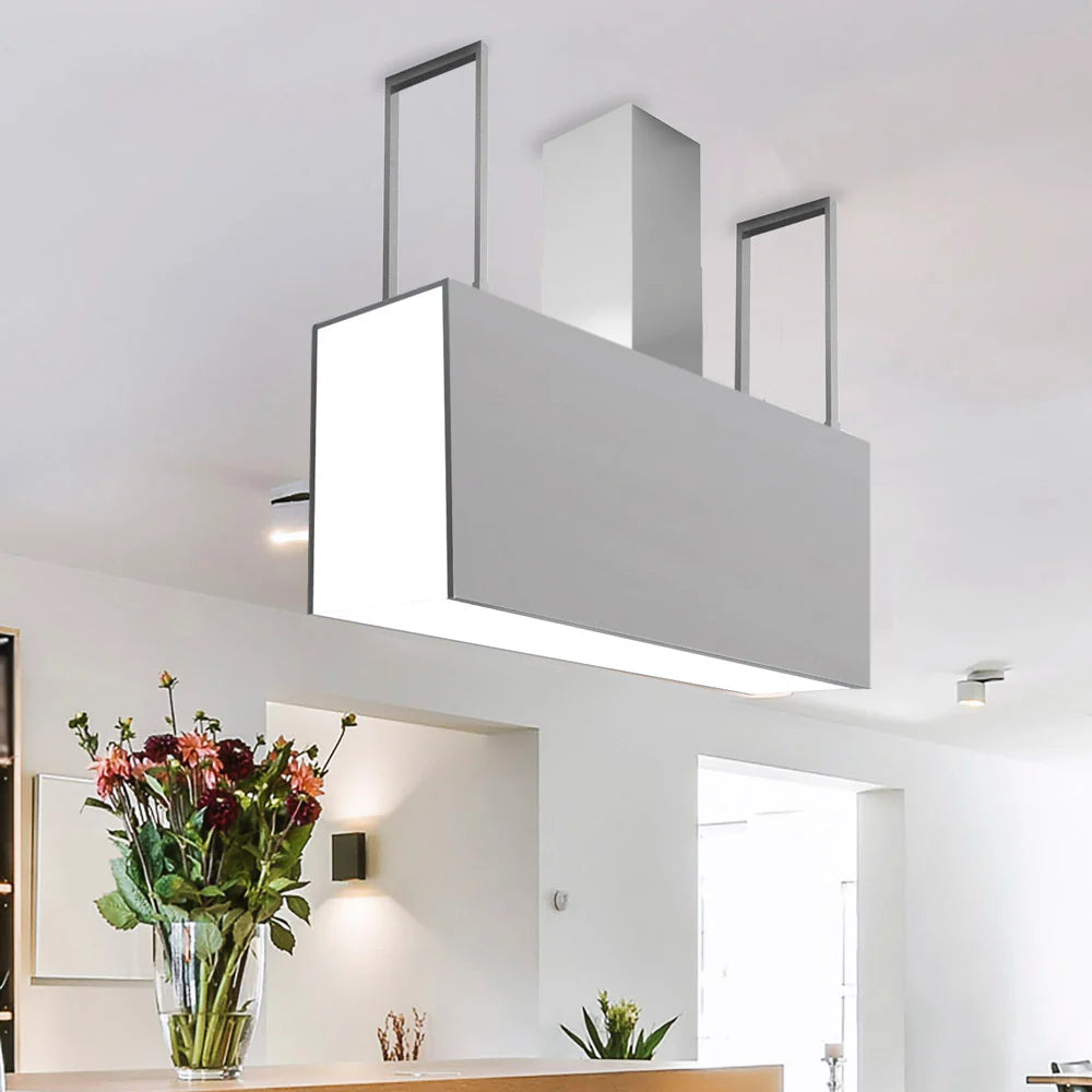 Angelo Island Cooker Hood Installed in a Sleek and Modern Kitchen With LED Lighting On and Wings/Doors Closed.