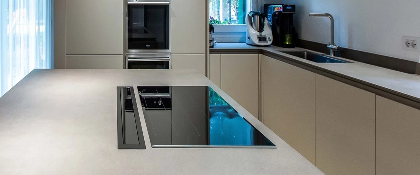 90cm Black Downdraft Extractor Installed & Hidden In A Sleek Modern Kitchen. 