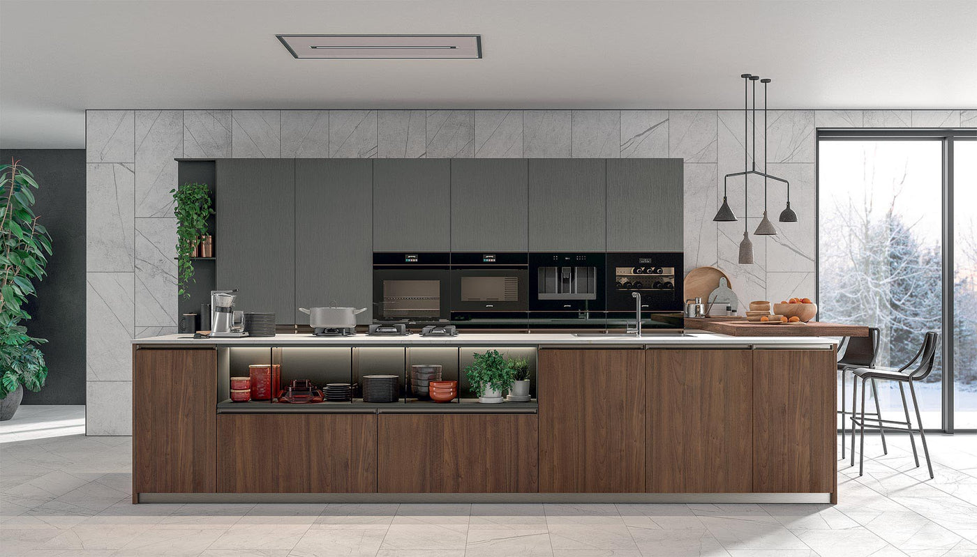 Synergy Ceiling Cooker Hood Installed In a Large, Modern Kitchen Featuring Grey and Wood Cabinets and Feature Pendant Lighting 